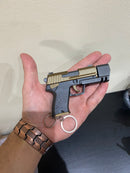 PETECO – Chaveiro Mini Pistola Antiestresse com Ciclagem